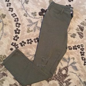 Women’s distressed rockstar jeans
